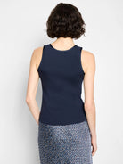 Navy blue ribbed knit tank top, back view, with a round neck and dark trim.