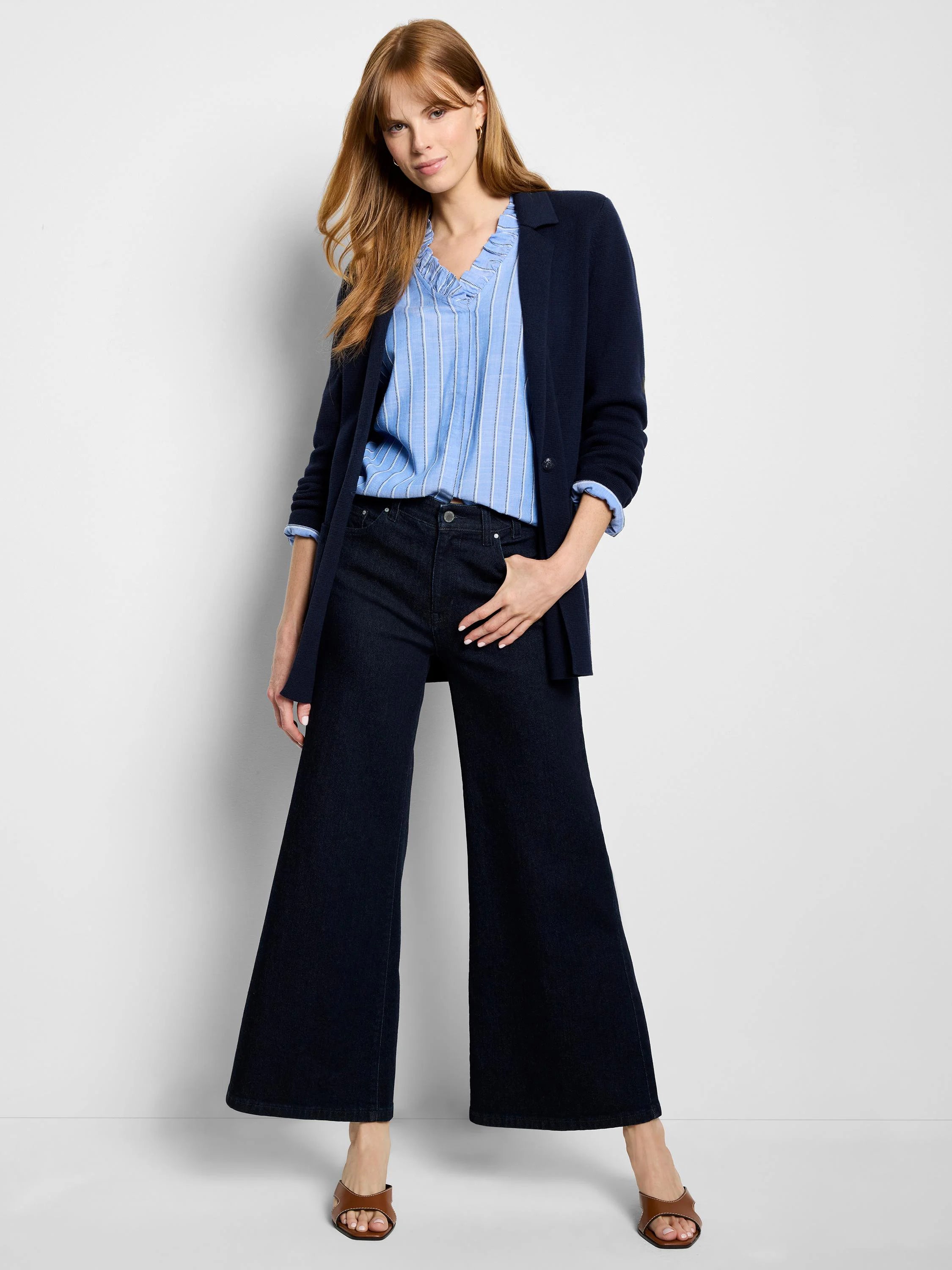 Dark navy knit blazer with structured lapels, open front, and hip-length fit.