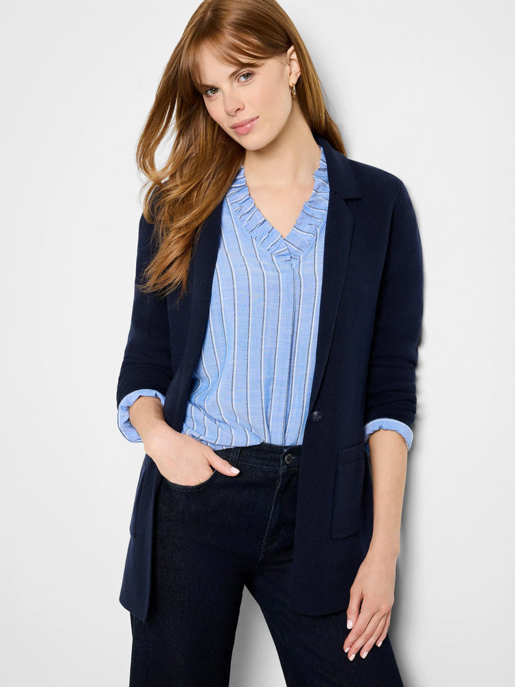 Navy knit blazer with an open front, soft lapels, and front patch pockets.