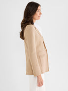 A tan knit blazer featuring a classic fit, notch lapels, a single button closure, and a front patch pocket.