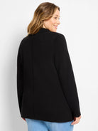 Black knit blazer with a subtle textured weave, long sleeves, and hip-length. Model shown from the back.