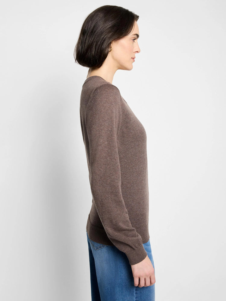 Muted brown, fine-knit crew neck sweater with long sleeves, ribbed cuffs and hem.