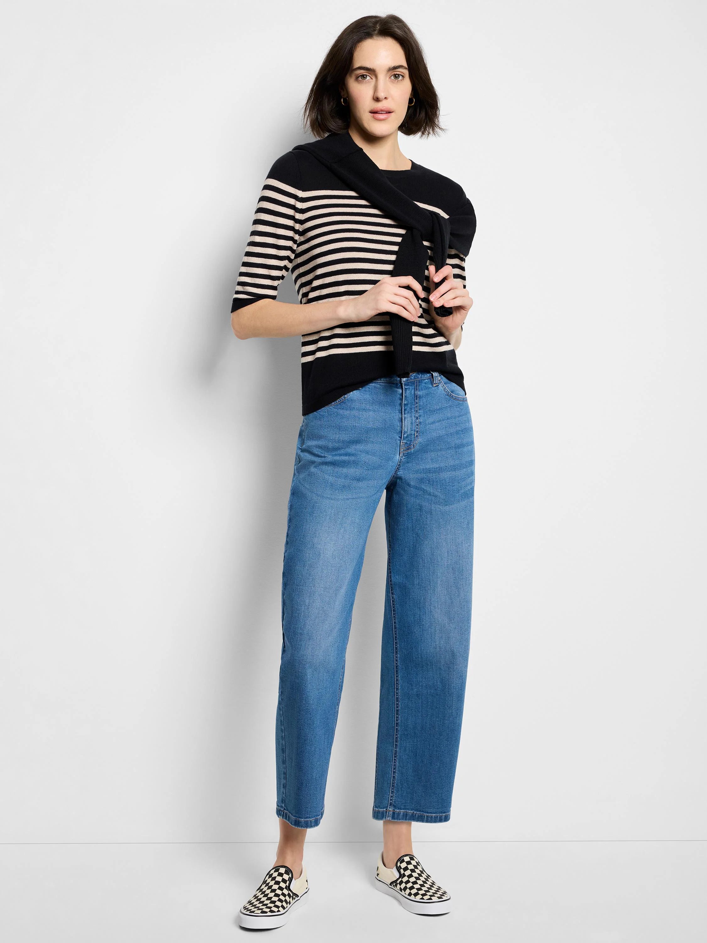 Black and cream horizontal striped sweater tee with elbow-length sleeves and a crew neck.