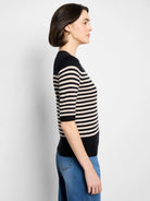 Black and cream striped sweater tee with 3/4 sleeves.