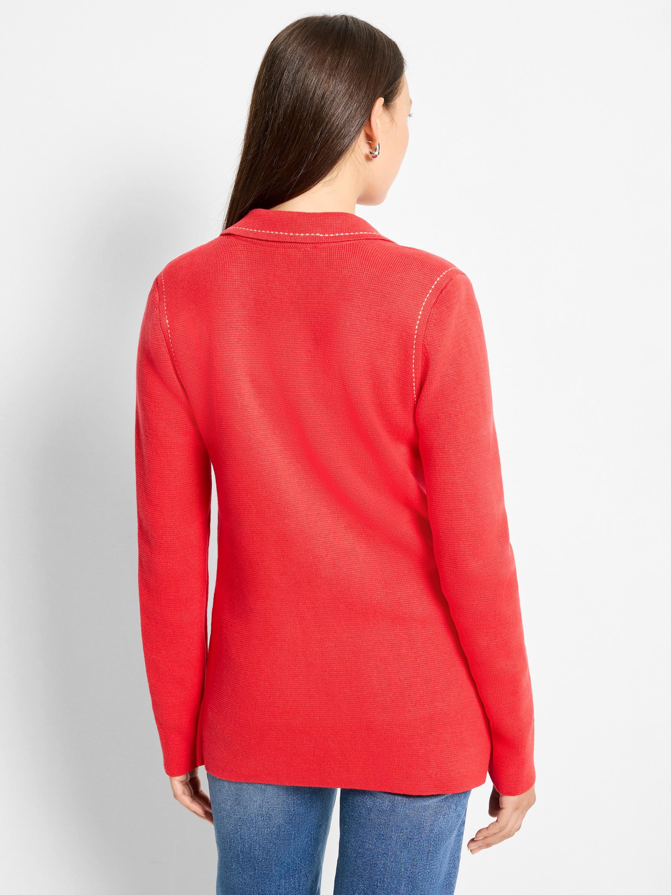 Red knit blazer with white contrast stitching along the collar and shoulder seams, shown from the back.