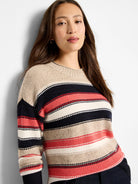 Crew neck sweater with speckled beige, navy, coral, and cream horizontal stripes.