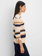 Light speckle-knit sweater with navy and tan mixed horizontal stripes, 3/4 sleeves.