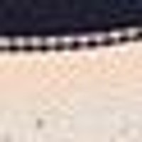 Smooth dark navy transitions to a warm, pale beige below, marked by a fine dark seam.