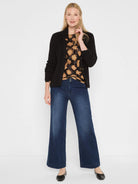 Black shaker knit cardy jacket with a ribbed texture. It has an open front and two visible buttons.