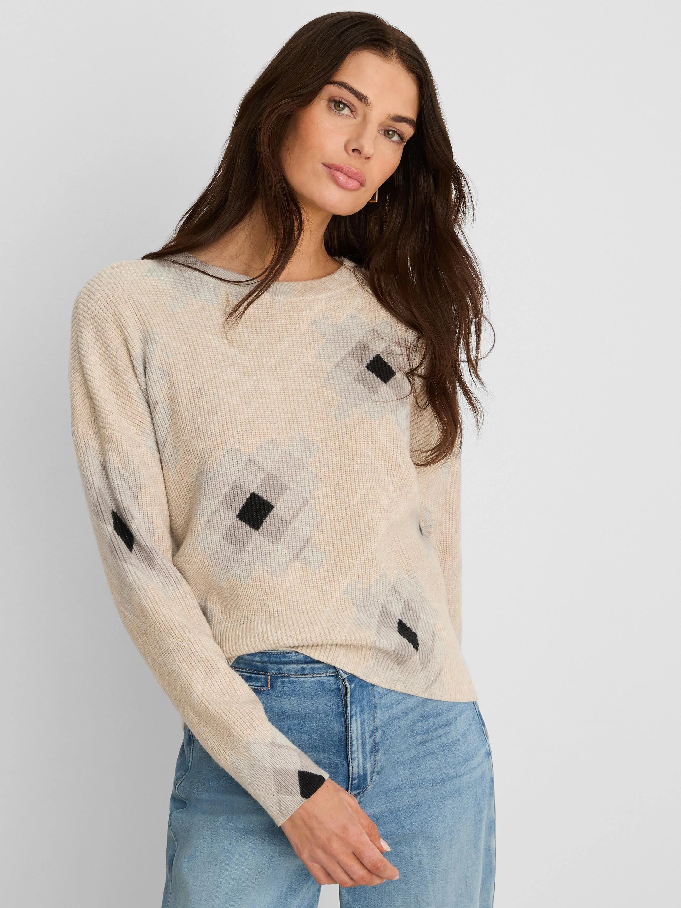 Light beige shaker stitch sweater with black diamond print.