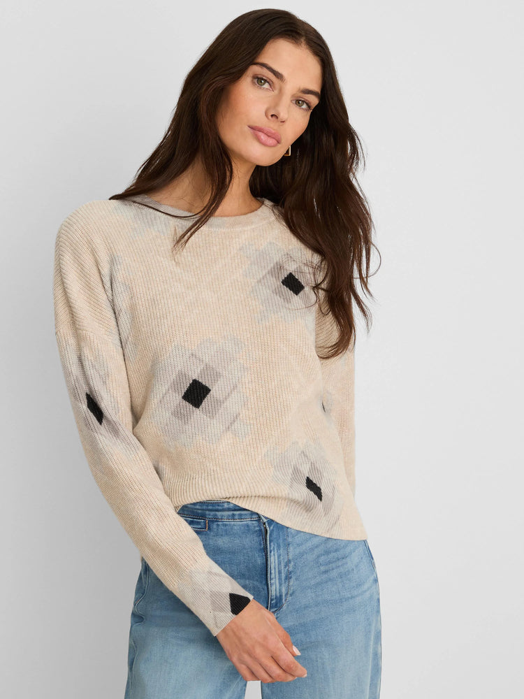 Light beige shaker stitch sweater with black diamond print.