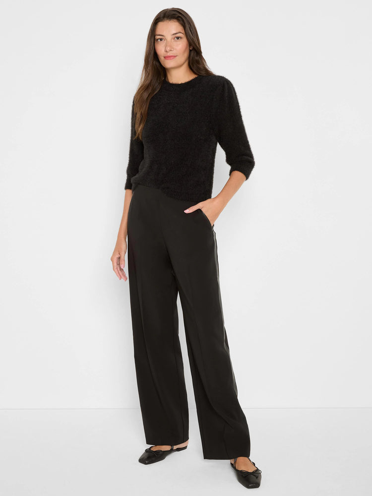 Black fuzzy sweater with 3/4 sleeves and a crew neck.