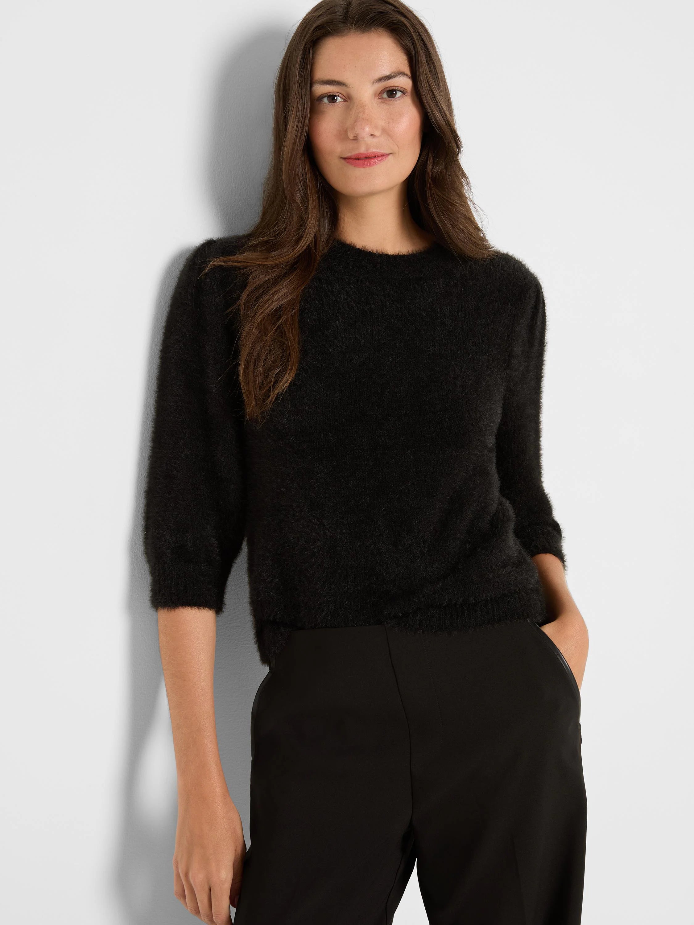 Black fuzzy cropped sweater with 3/4 sleeves and a crew neck.
