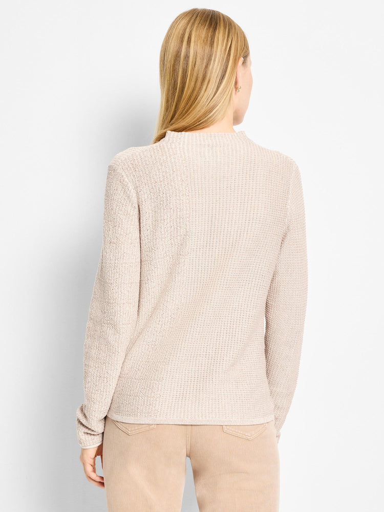 Light beige mock neck sweater. Features a textured pixel knit pattern with small squares and long sleeves.