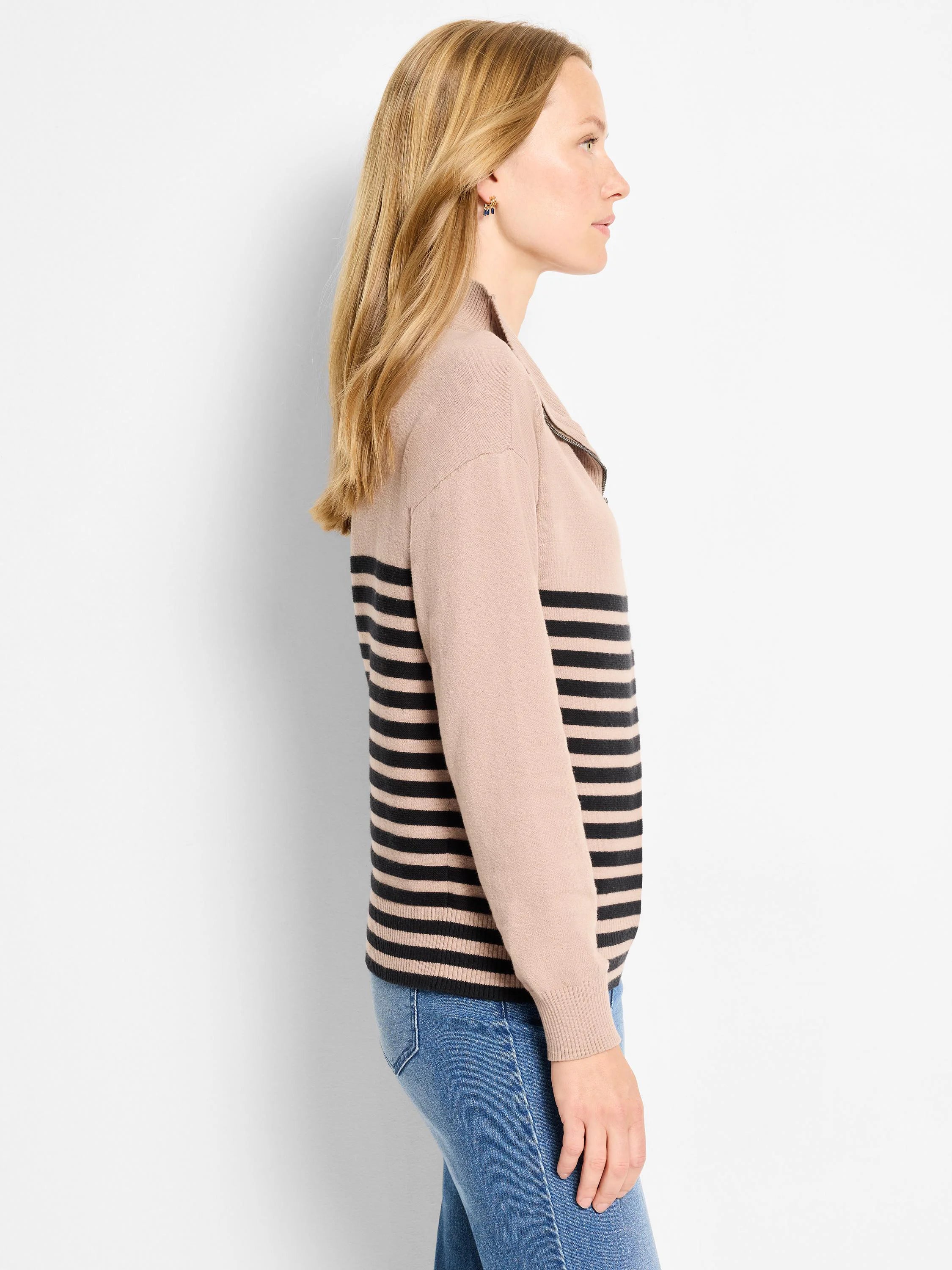 Beige zip-neck sweater featuring black horizontal stripes, ribbed cuffs, and hem.