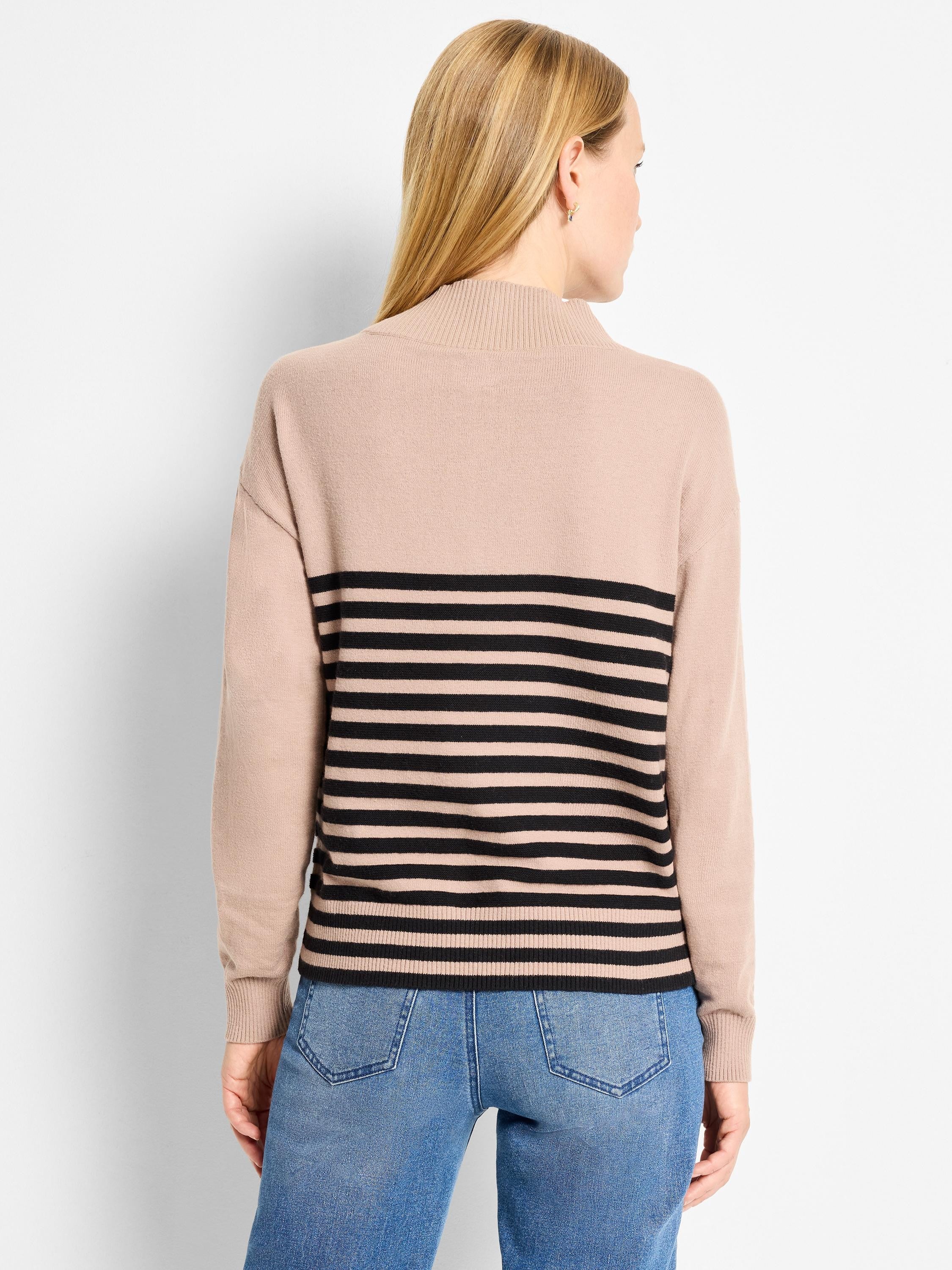 Tan sweater with black horizontal stripes. Features a high ribbed neck and ribbed cuffs.