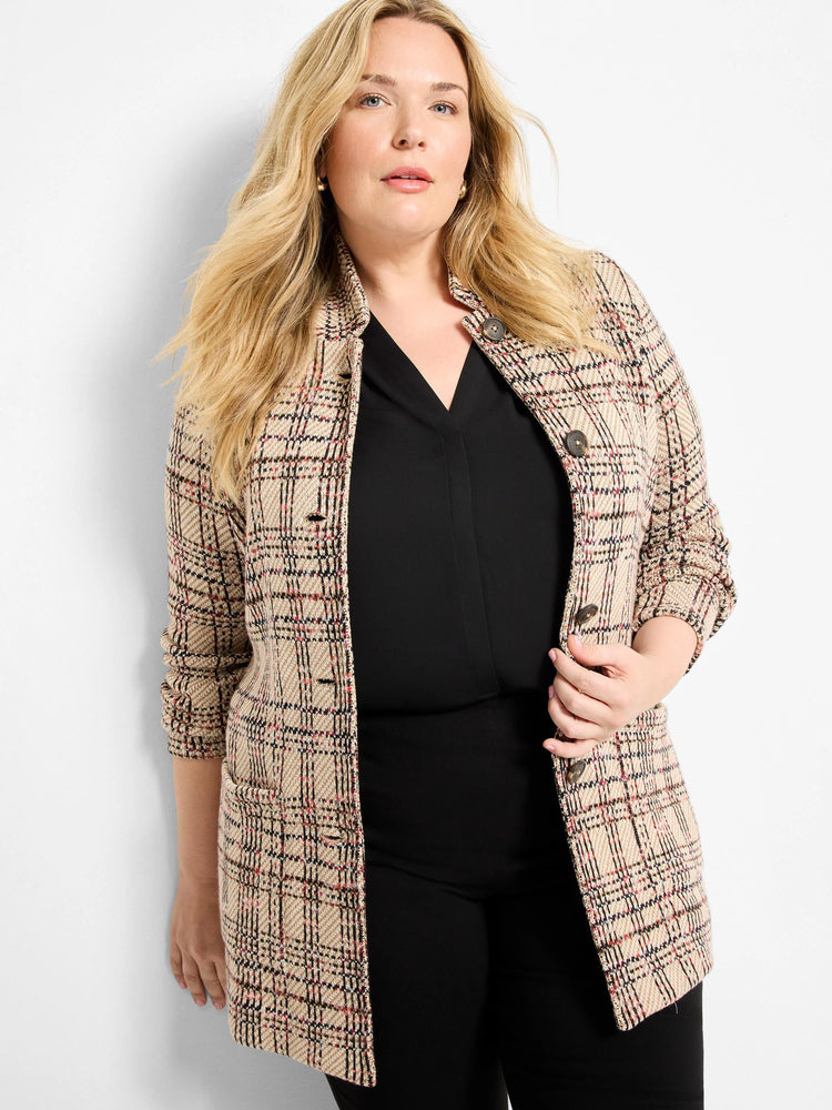 Beige knit blazer with a black and red plaid pattern, featuring a standing collar and dark buttons.