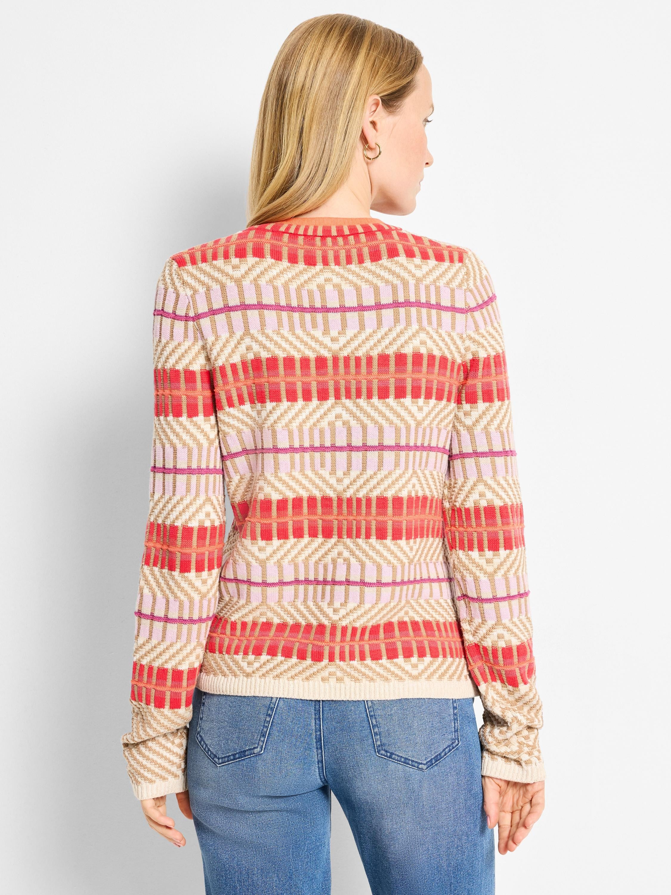 Red, light pink, dark pink, and tan geometric knit cardigan with horizontal stripes and diamond patterns.
