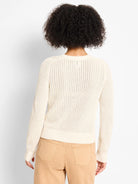 Cream open-knit cardigan with long sleeves, ribbed cuffs and hem.