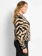 Tan and black zebra stripe long-sleeve jacquard cardigan.