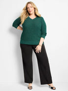 Emerald shimmer V-neck sweater, waffle knit, with ribbed cuffs and hem.