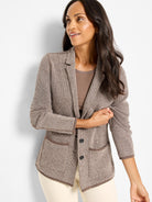 Pixel knit jacket in brown and tan, featuring notched lapels, two dark buttons, patch pockets, and dark brown trim.
