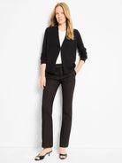 Black open-front cardigan with a V-neck, long sleeves, ribbed cuffs, and ribbed hem.