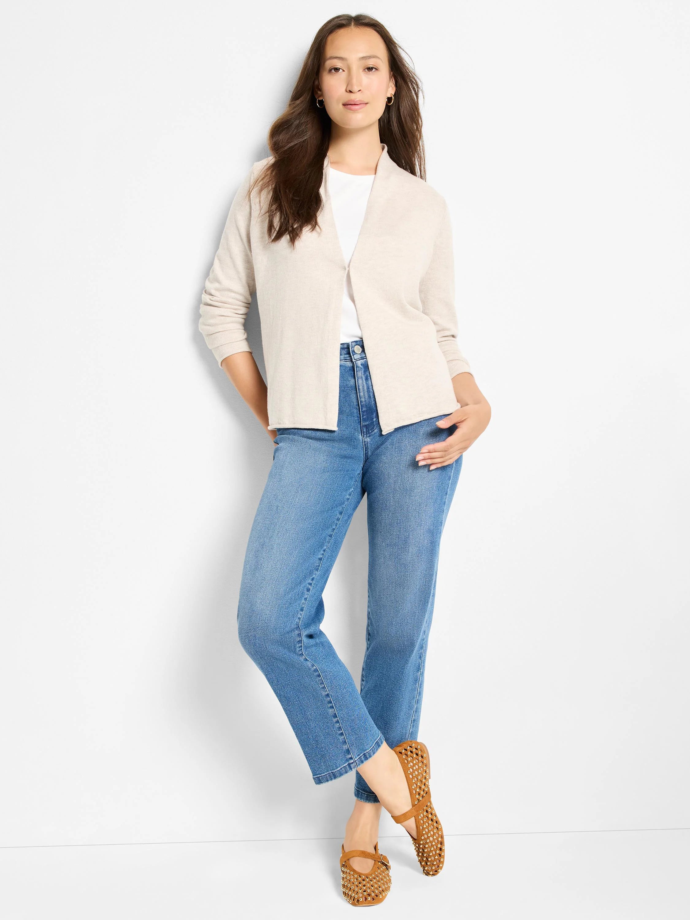 Light beige open-front knit cardigan with 3/4 sleeves, hip-length.