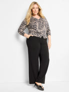 Tan & dark gray irregular dot button-up V-neck sweater with 3/4 sleeves.