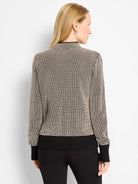 Cream and black pixel knit funnel neck sweater with ribbed black cuffs and hem.