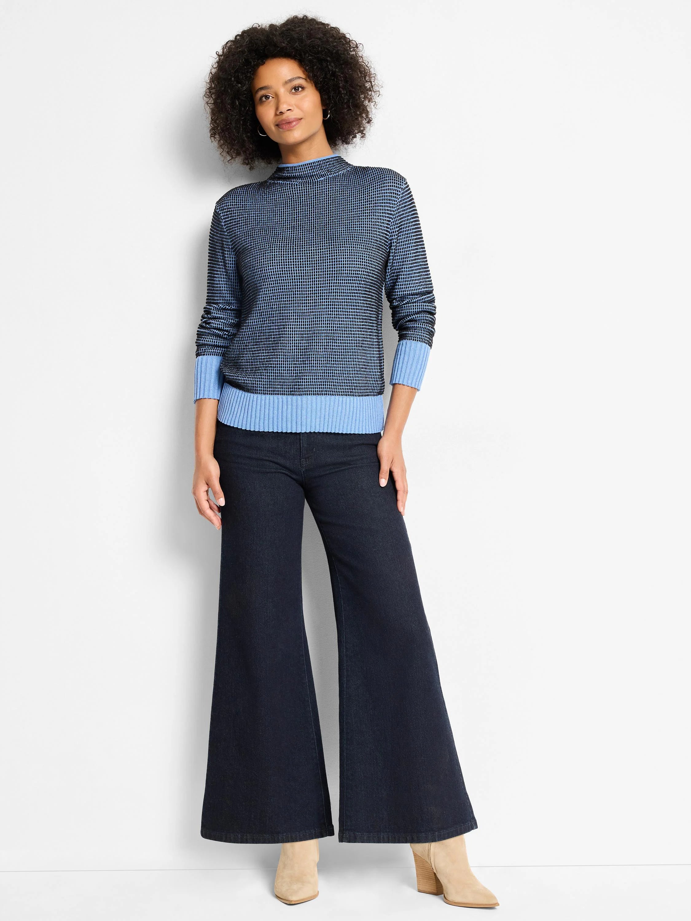 Navy & light blue funnel neck sweater with pixel knit grid pattern. Ribbed light blue cuffs, hem, & collar.