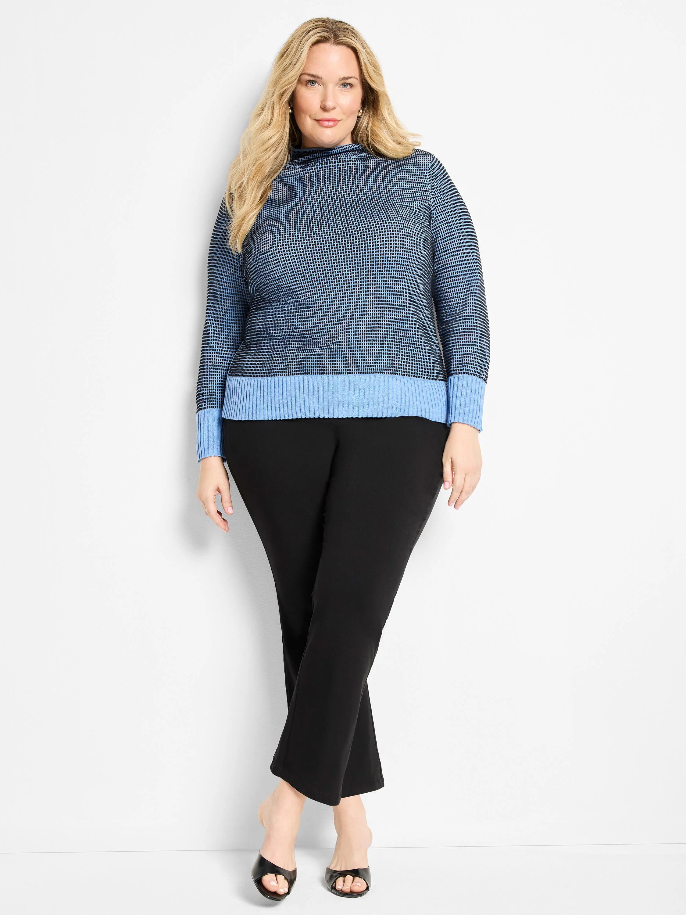 Blue funnel neck sweater with dark blue pixel knit body & light blue ribbed cuffs & hem.