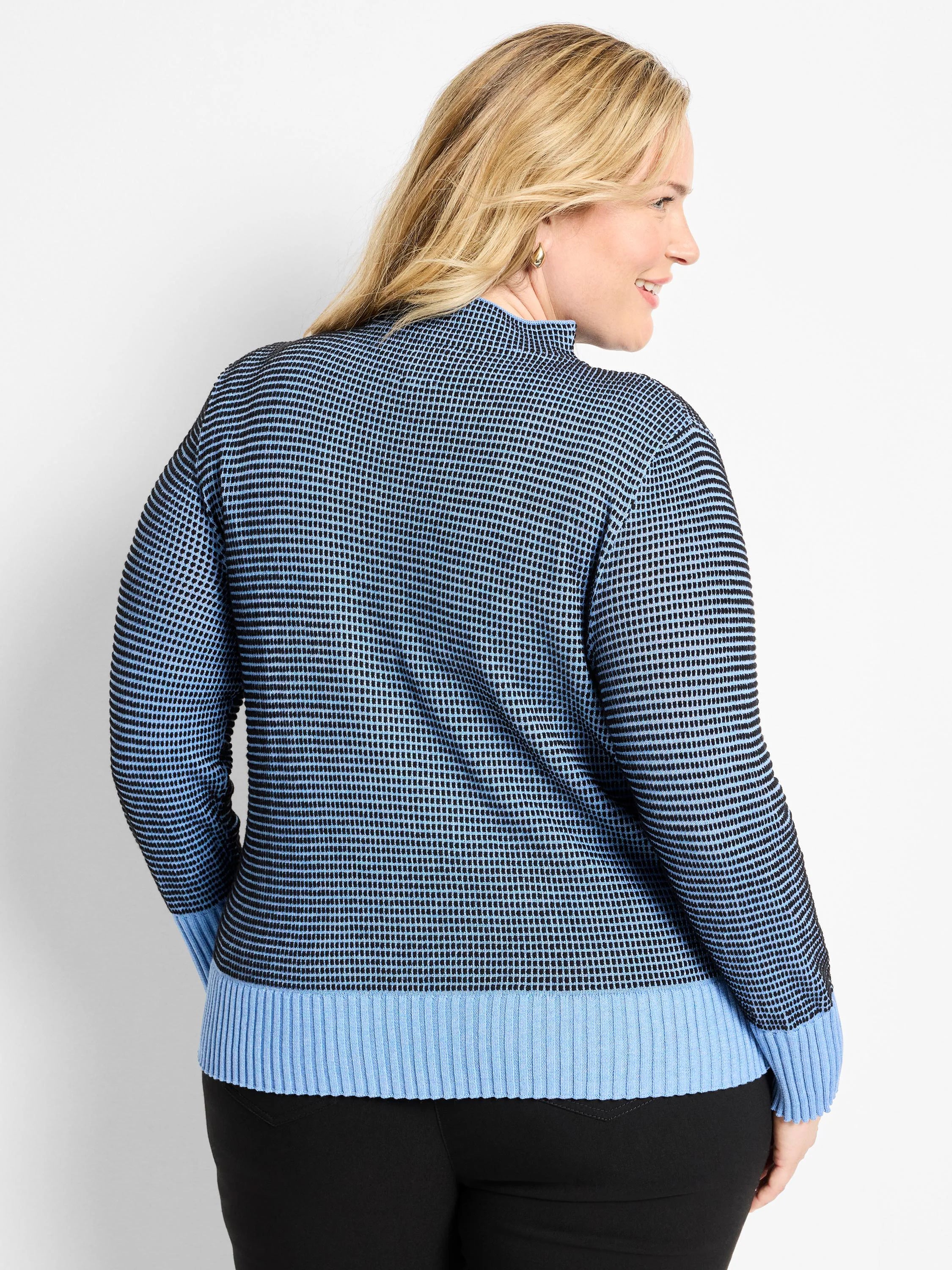 Blue & black pixel knit funnel neck sweater with light blue ribbed cuffs and hem.