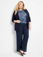 Navy blue knit stitch cardigan, open front, long sleeves, ribbed cuffs, and two front patch pockets.