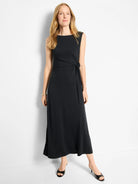 Black sleeveless maxi dress with side knot detail and subtle side slits.