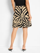 Black and tan zebra jacquard knit mini skirt, flared shape.