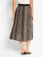 Midi A-line knit skirt. Ombre pixel pattern, dark brown fading to light beige, with a black waistband.
