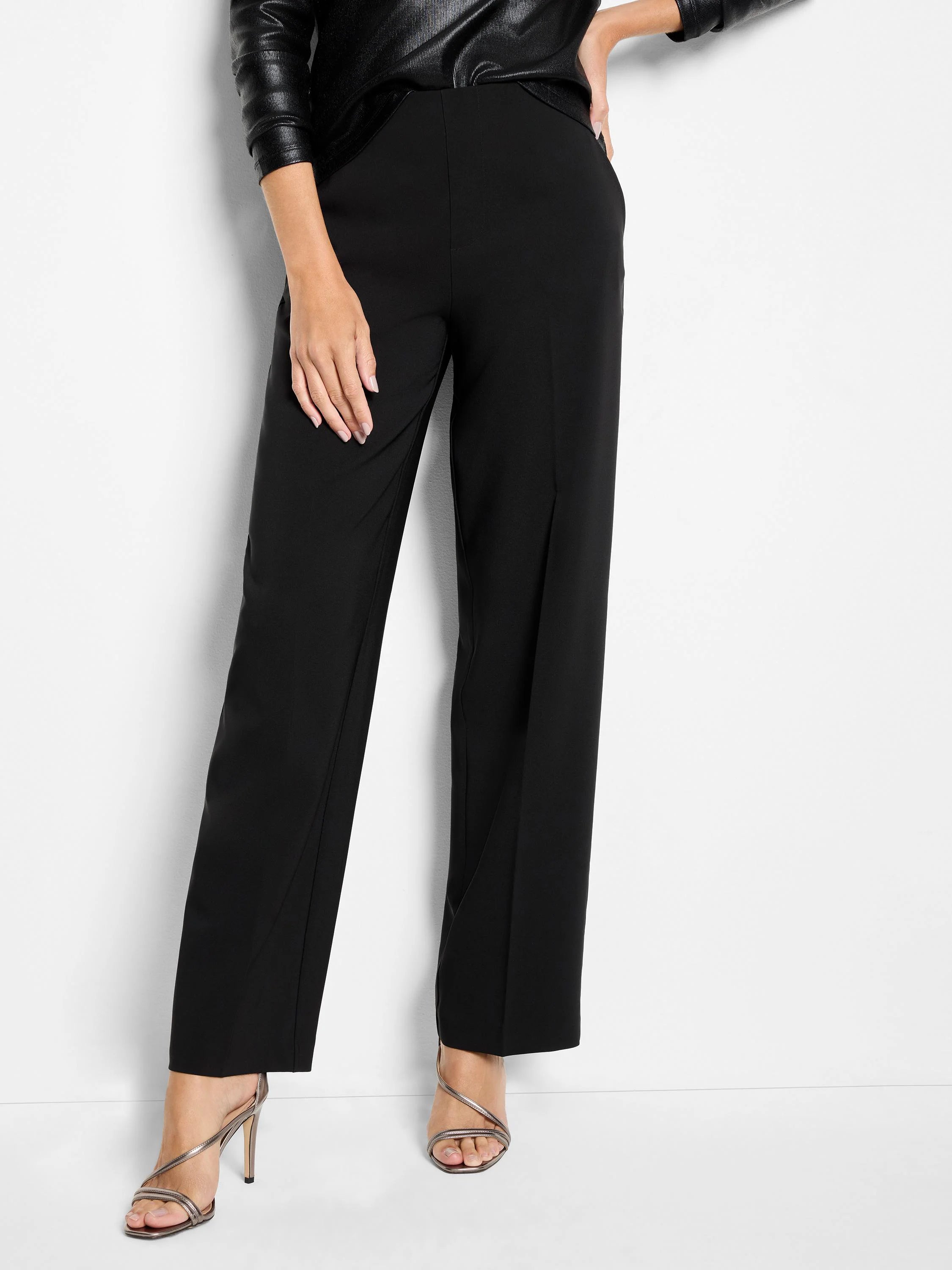 Black wide-leg, high-waisted pants with a sleek finish and pressed front creases.