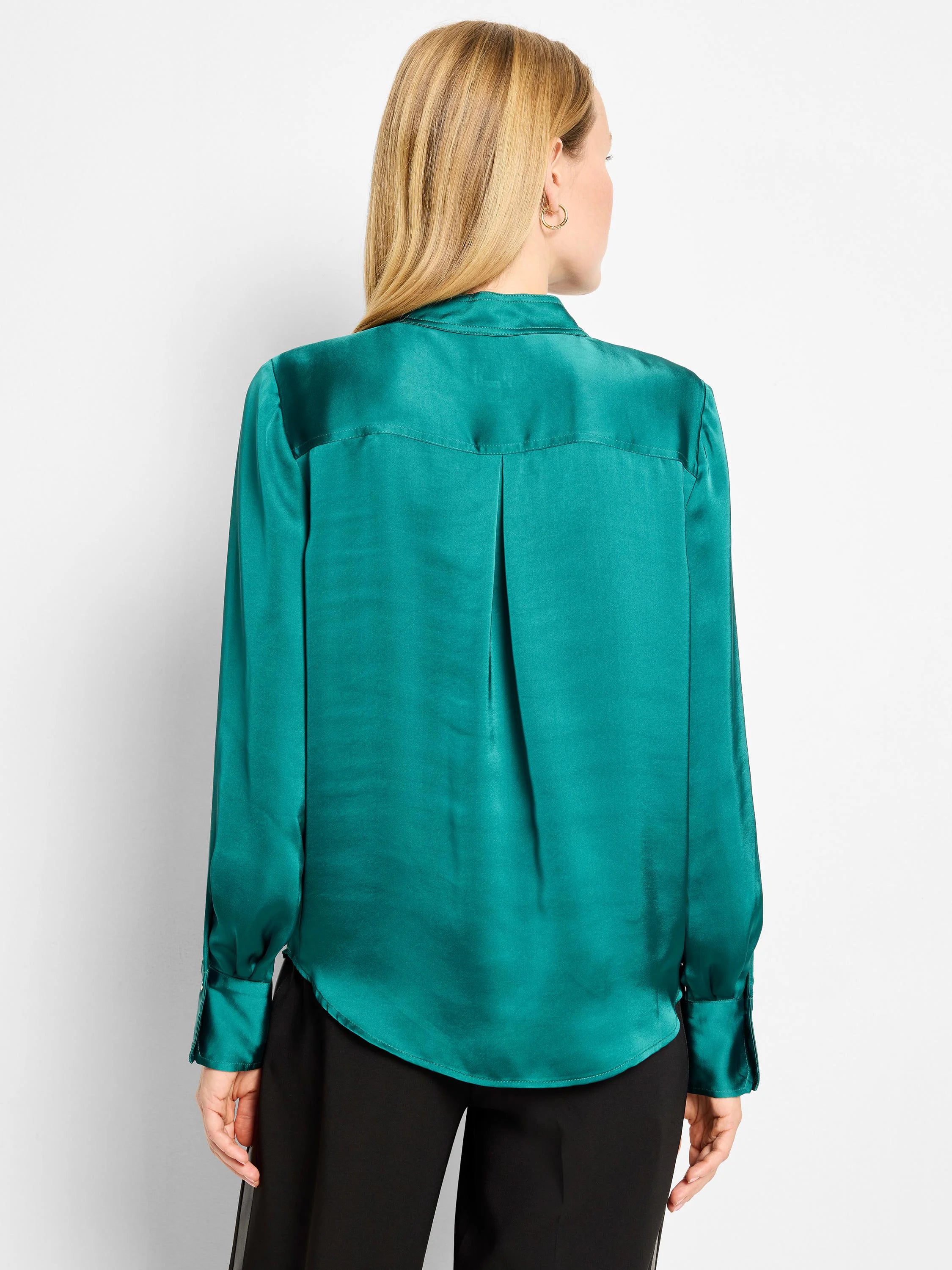 Emerald green glossy shirt, back view. Features a shoulder yoke, central back pleat, and wide cuffs.