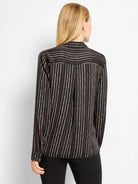 Black shirt with painted white & brown stripes. Vertical on body, horizontal & wavy on the back yoke.