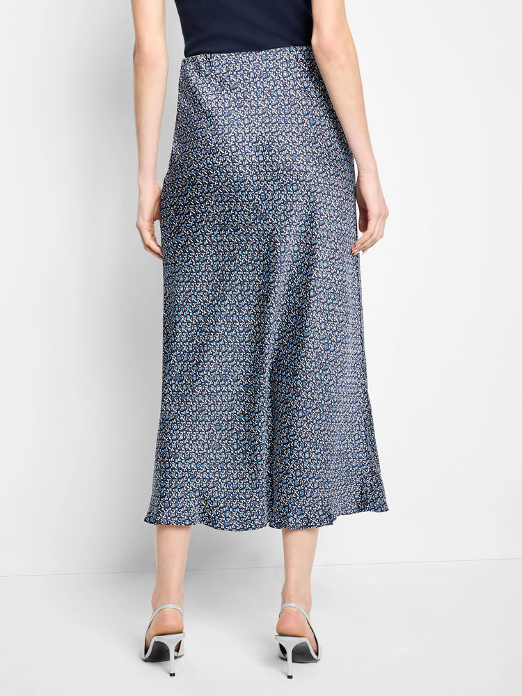 Midi slip skirt, dark-blue base with a light-blue and white repeating geometric pattern.  A-line silhouette.