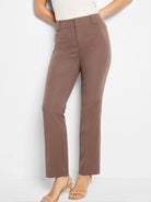 Brown demi-boot pants with a flat front, belt loops, and vertical front leg seams.