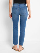 Medium blue straight ankle jeans, shown from the back, with two back pockets, belt loops, and a faded wash.