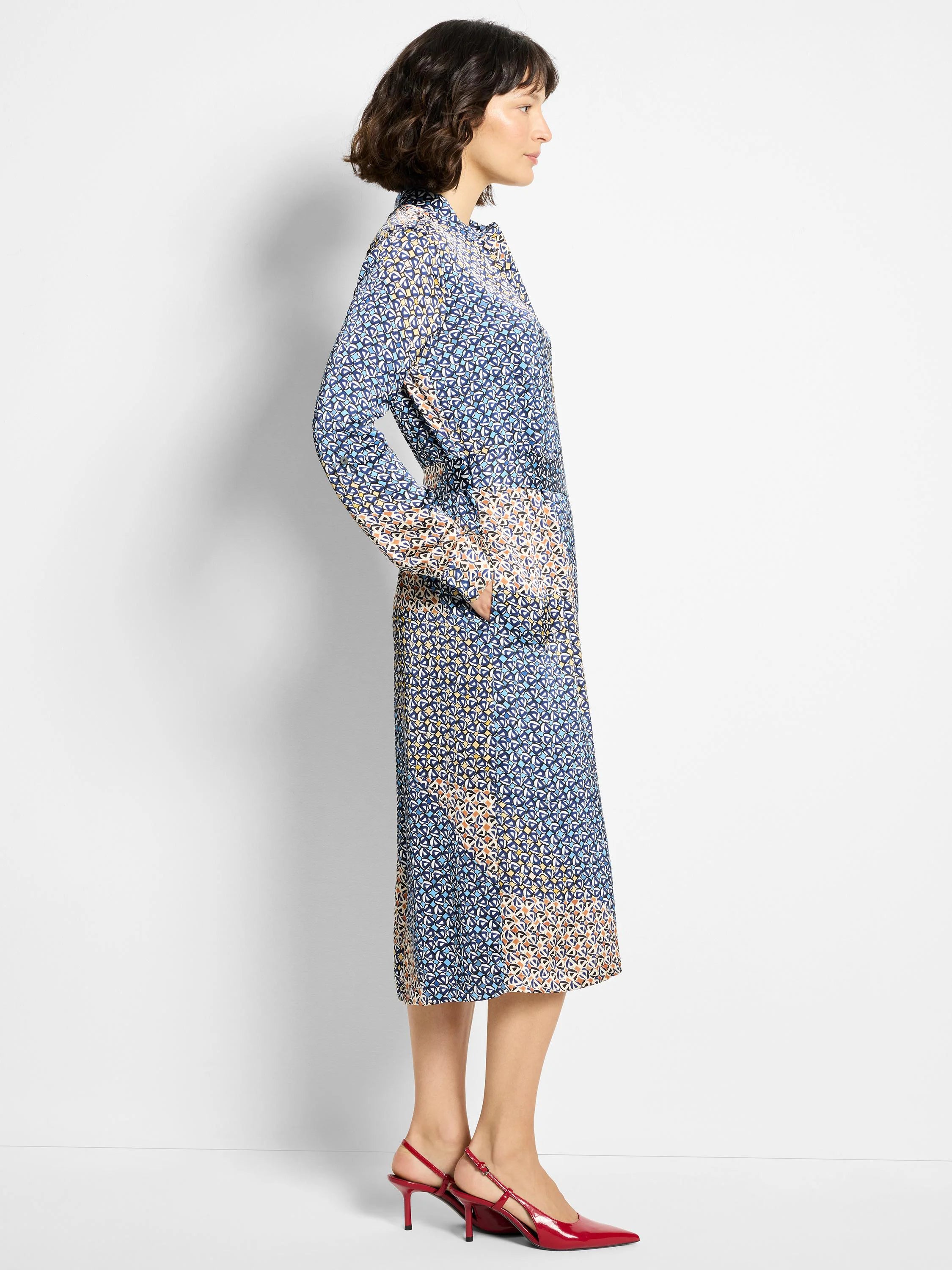Midi shirt dress, blue, beige, and white geometric print.  Long sleeves, belted waist.