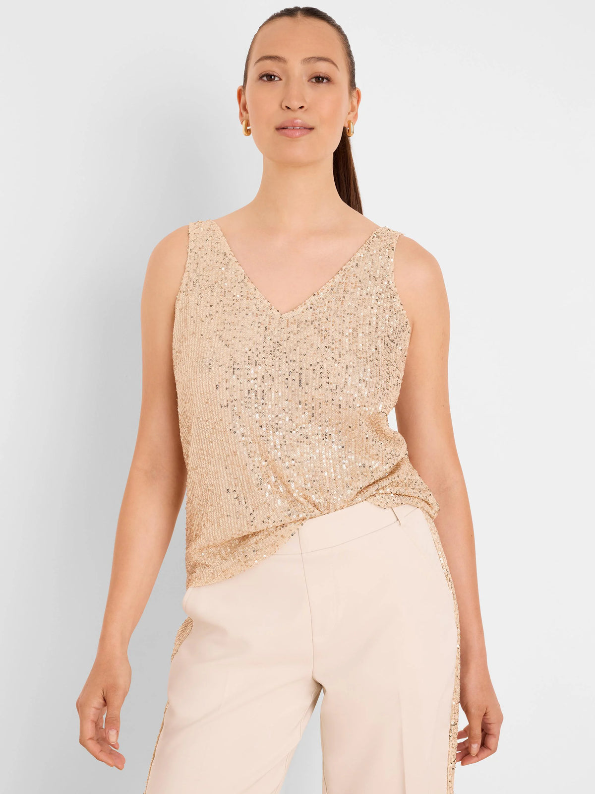 Sleeveless champagne sequin knit tank top with a V-neck.