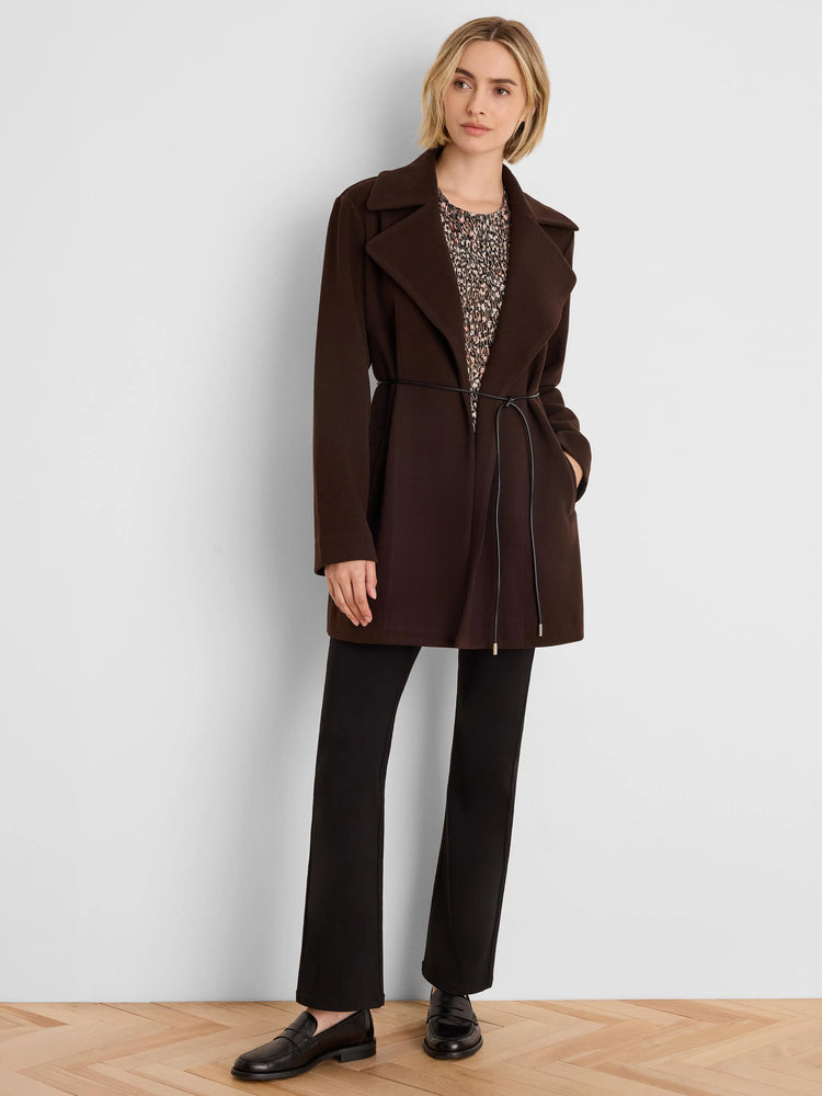 Dark brown knit twill wrap jacket, mid-thigh length, wide lapels, with a thin black tie belt.