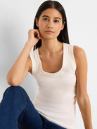 Cream ribbed scoop neck tank top.