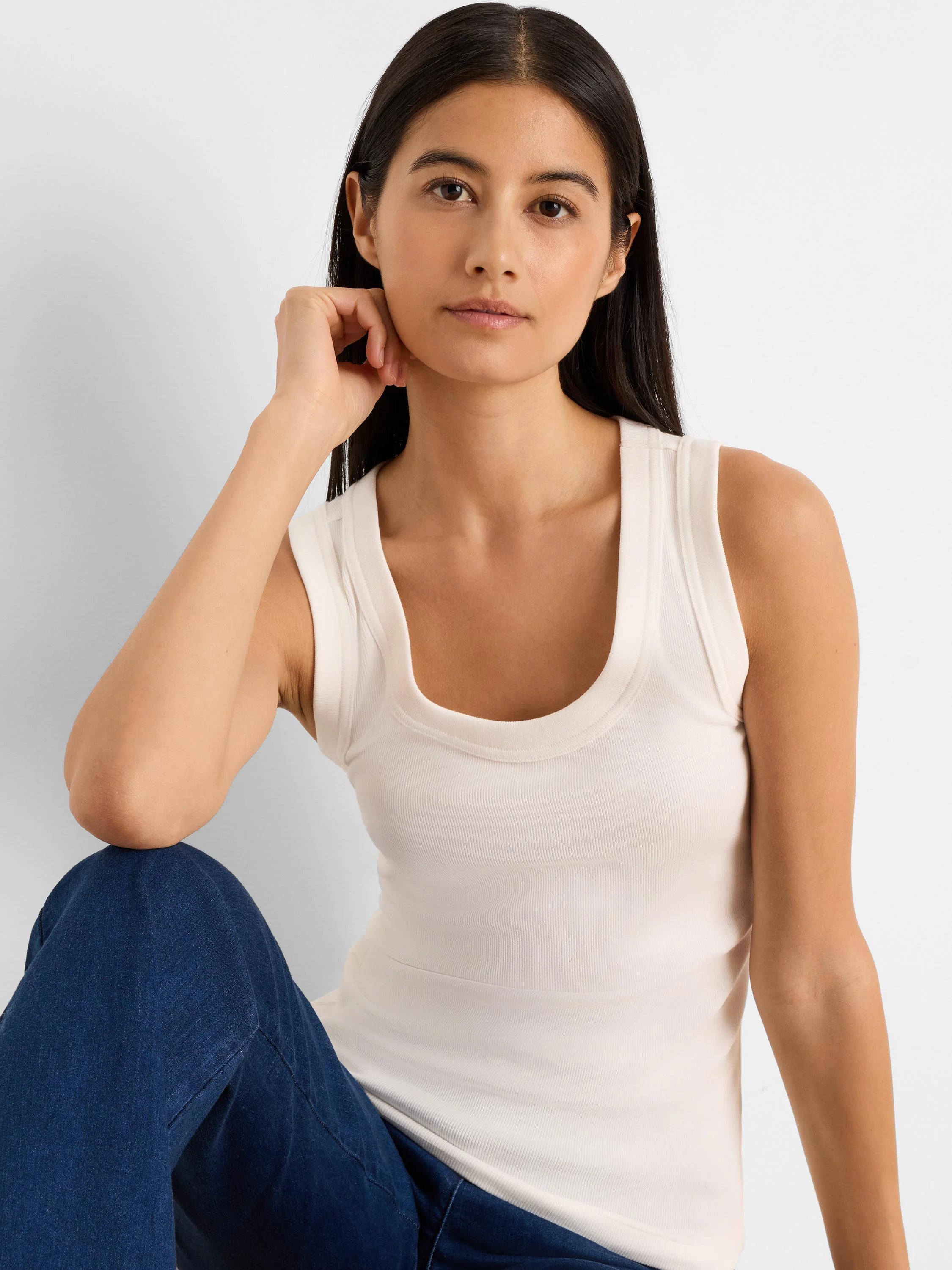 Cream ribbed scoop neck tank top.