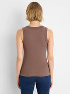 Brown ribbed knit tank top, back view. Rounded back neckline, vertical rib texture.