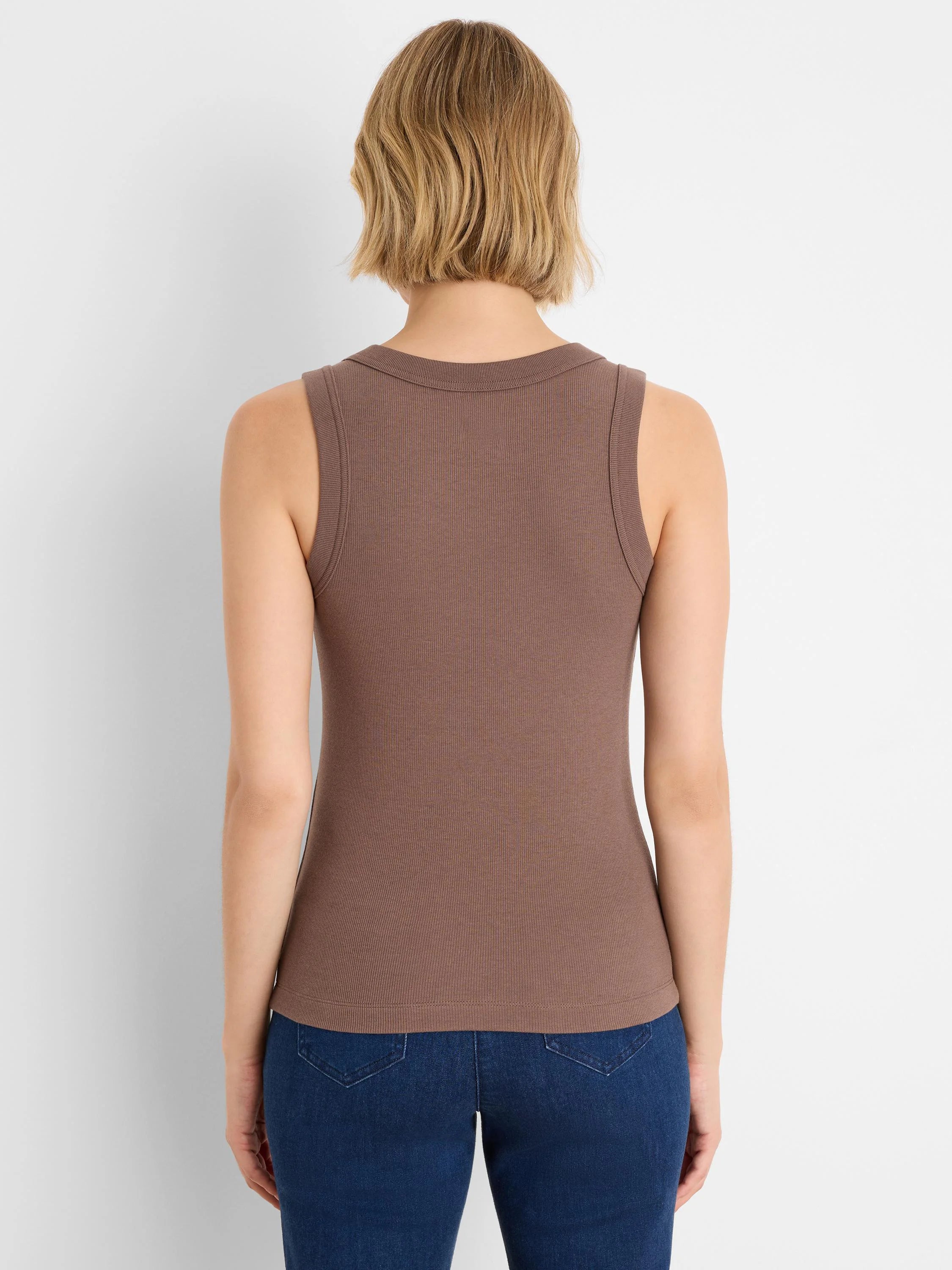 Brown ribbed knit tank top, back view. Rounded back neckline, vertical rib texture.